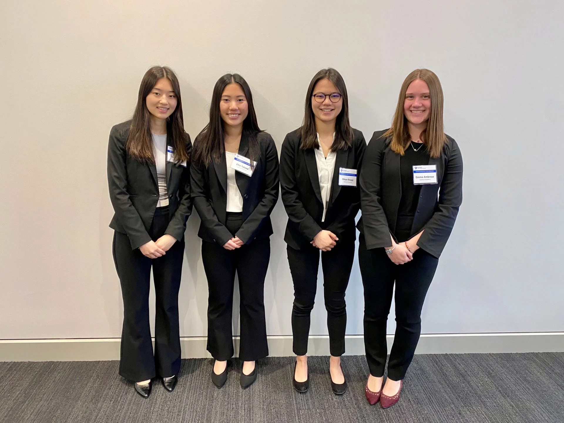 Portrait of Dell Case Competition winners Ambrose, Toland, Bang, & Knapp.