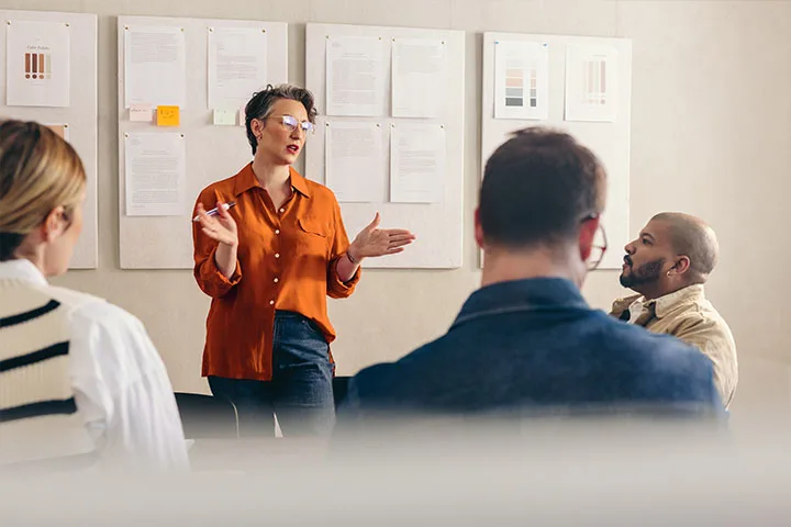 Woman leading brainstorming session