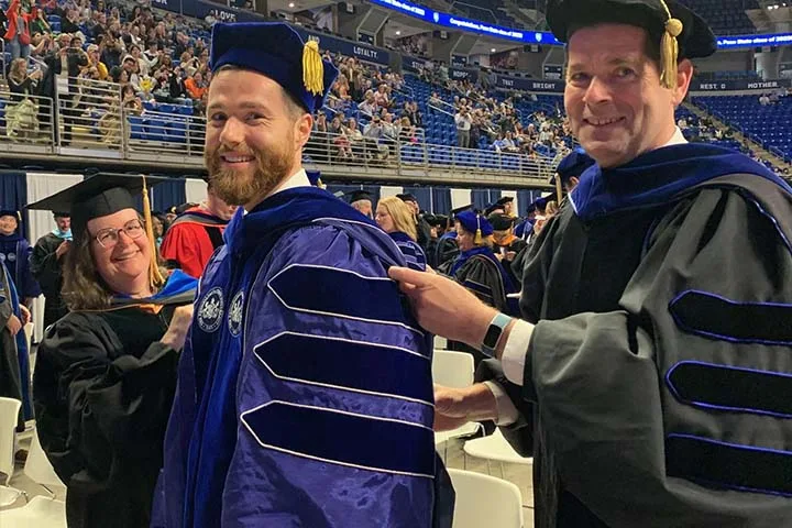 PhD Student at Commencement
