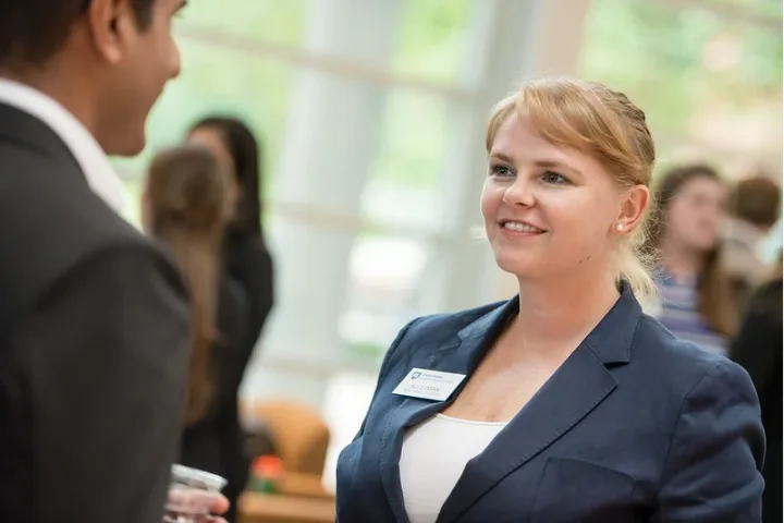 Student in professional attire at Networking Expo