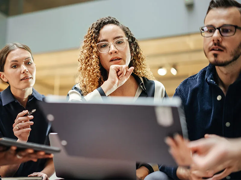 Woman leading a meeting with employees