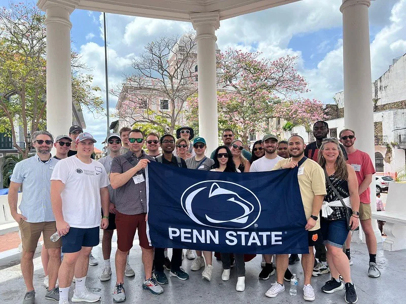Group of students hold the Penn State banner in Panama