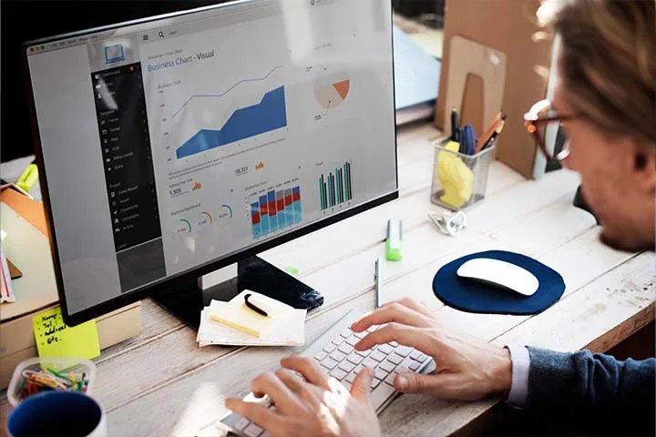 Man working on analytics dashboard