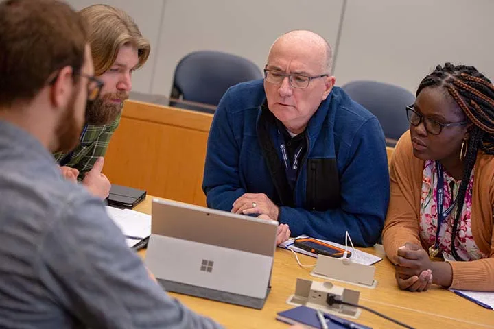 People in a course discussion