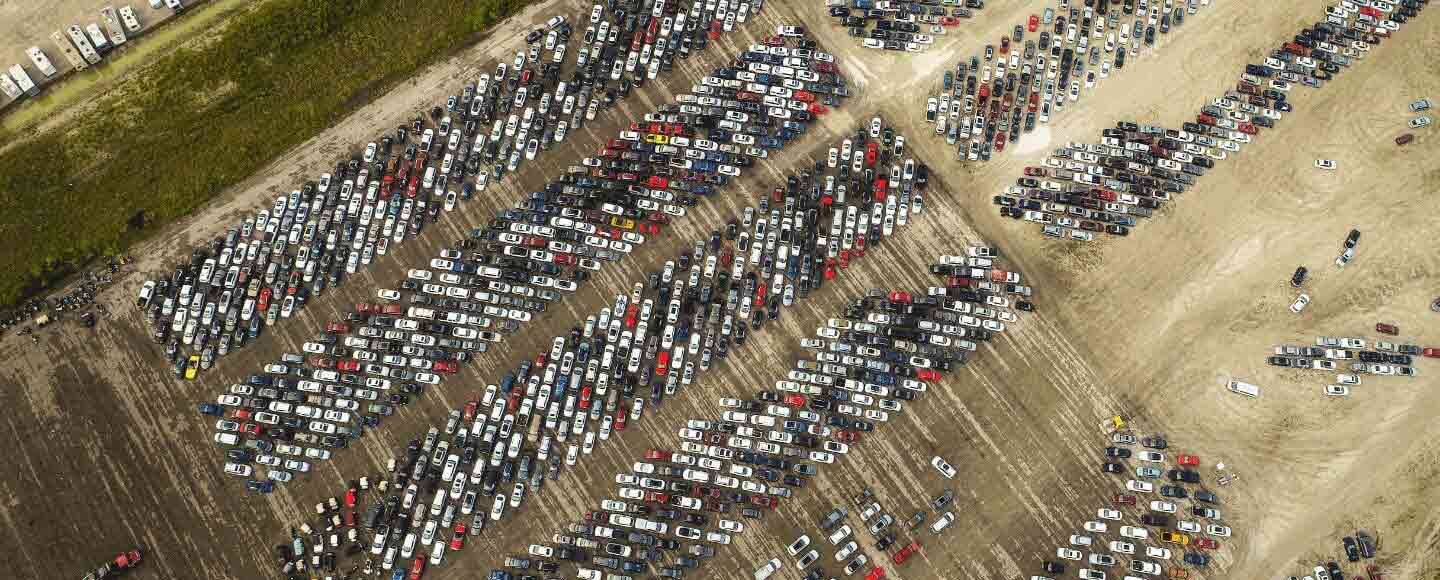 Overhead view of IAA branch lot full of parked cars.