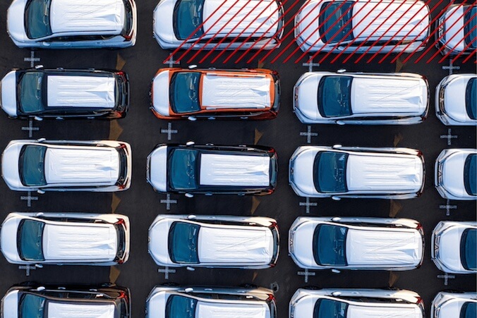 Aerial view of lot of cars