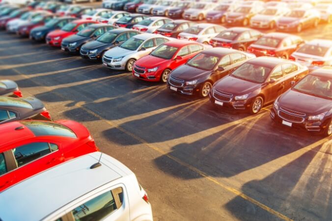 Lot of vehicles parked in rows