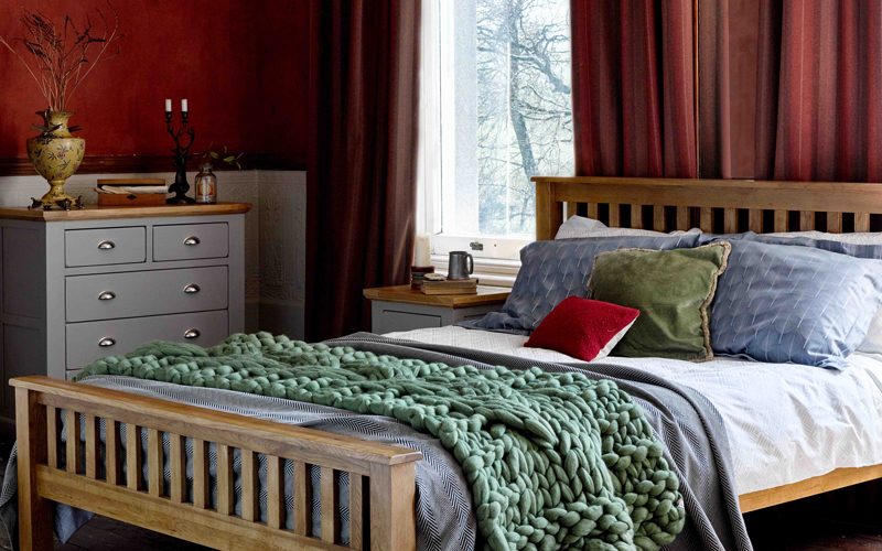 oak bed and grey painted chest of drawers