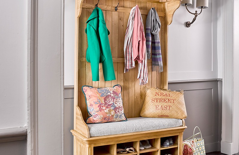 oak hallway stand against a wall with darker grey below the dado rail and lighter grey above