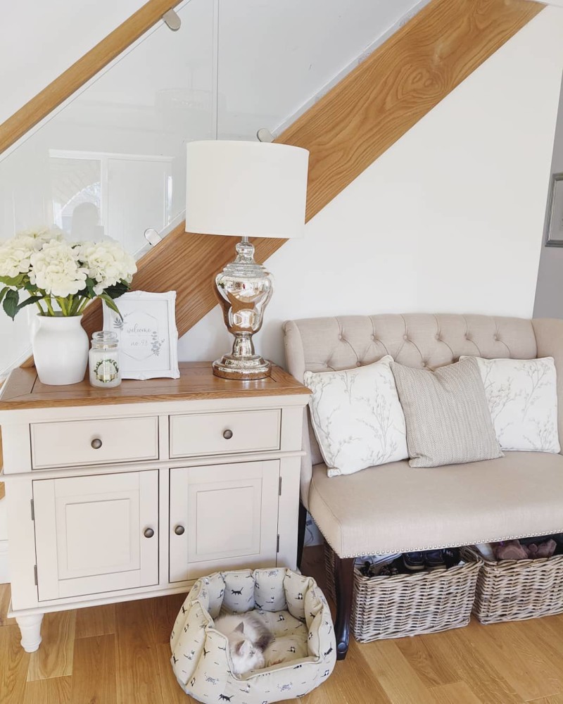 Rustic oak and light grey painted small sideboard in hallway