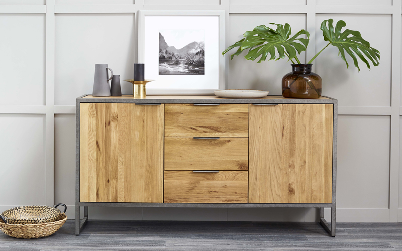 Industrial style dining sideboard with botanical accessories