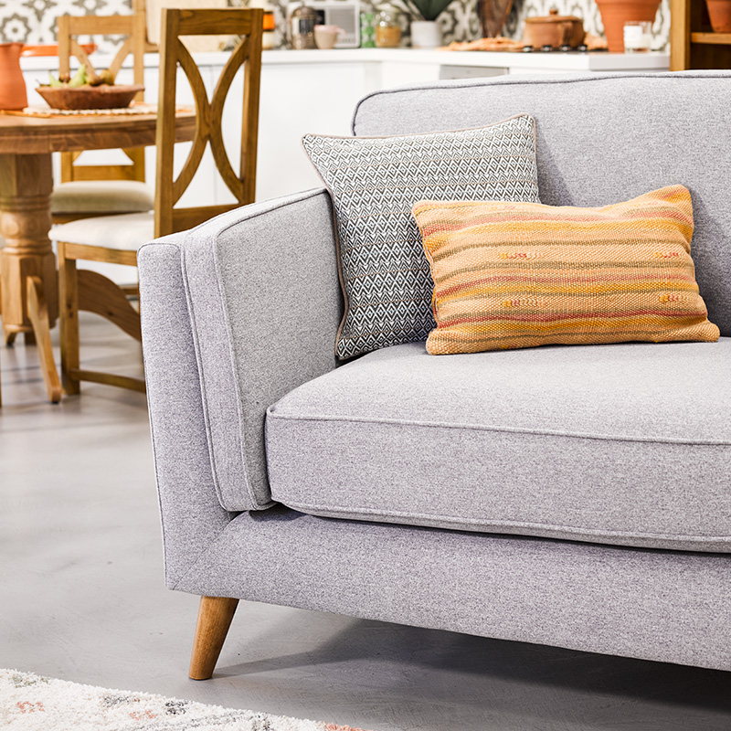 Grey sofa bright cushions