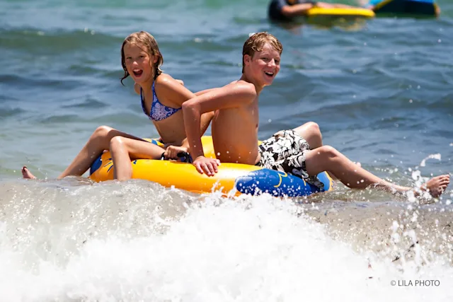 Children play at The Breakers beach