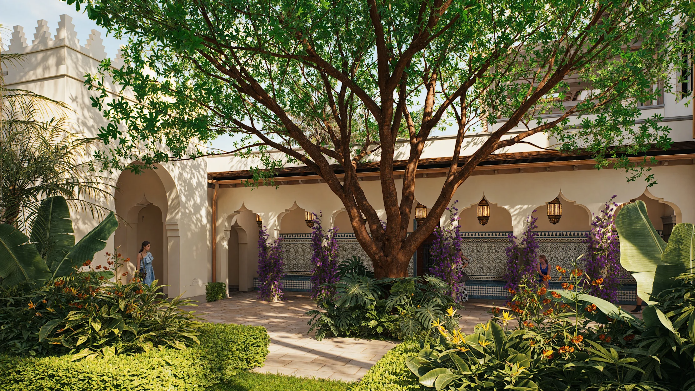 Moroccan-style courtyard with large tree, arched doorways, lanterns, and lush tropical plants.