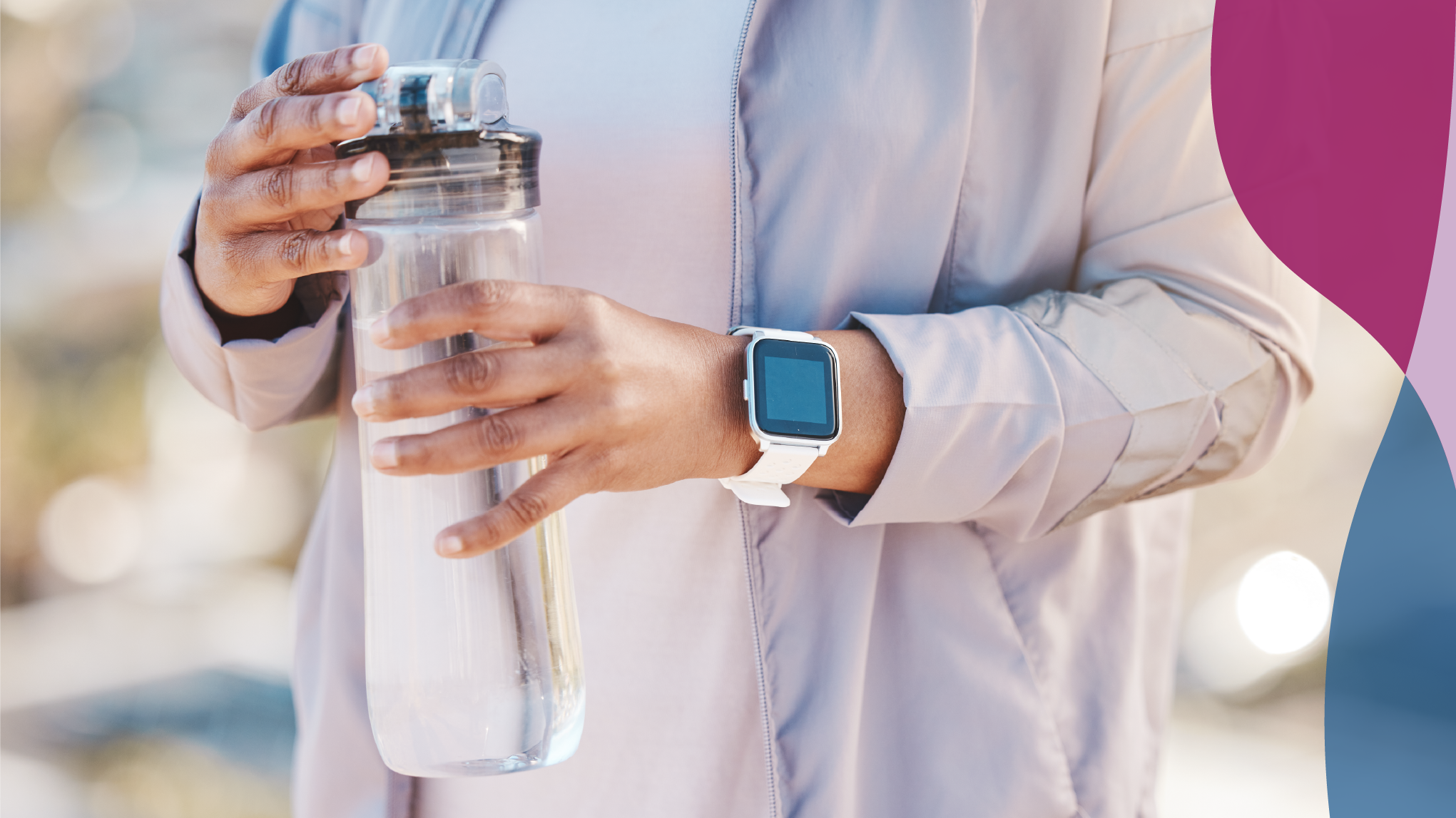 A woman holding a water bottle.