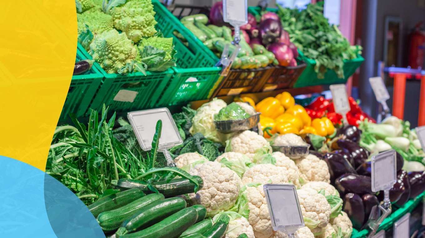 Various vegetables are displayed in a grocery store for purchase.