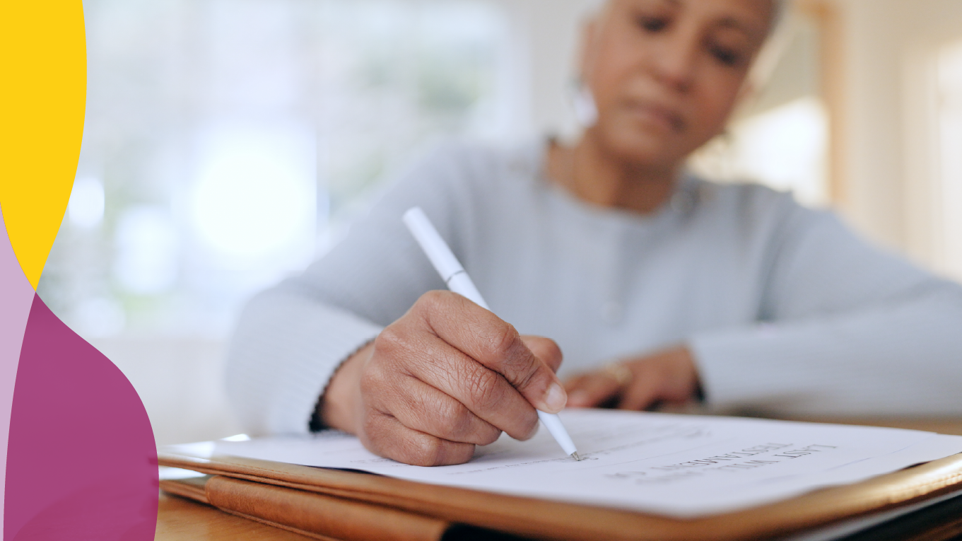 Woman writing on paper.