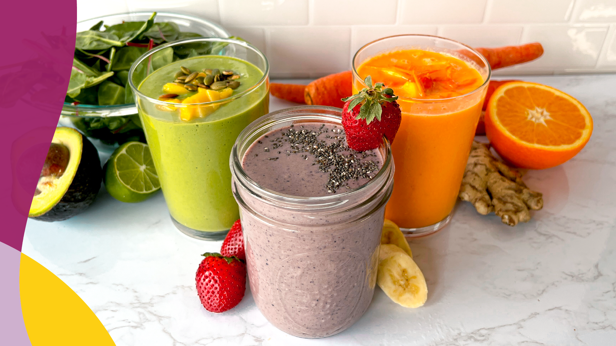 Colorful smoothies in glasses surrounded by colorful fruits and vegetables
