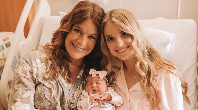 Kaitlyn Munoz and her mother, Chalise Smith, after giving birth to her daughter in the hospital