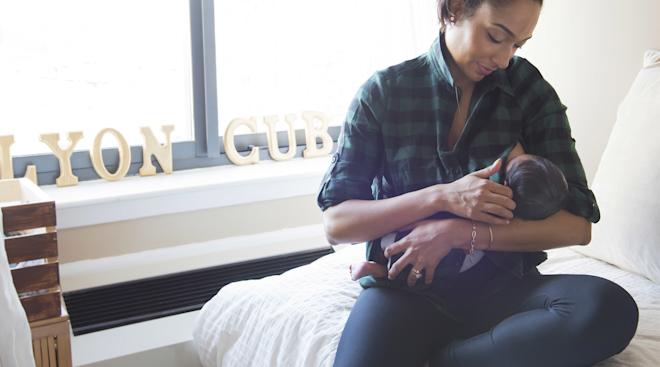 mom breastfeeding her new born baby