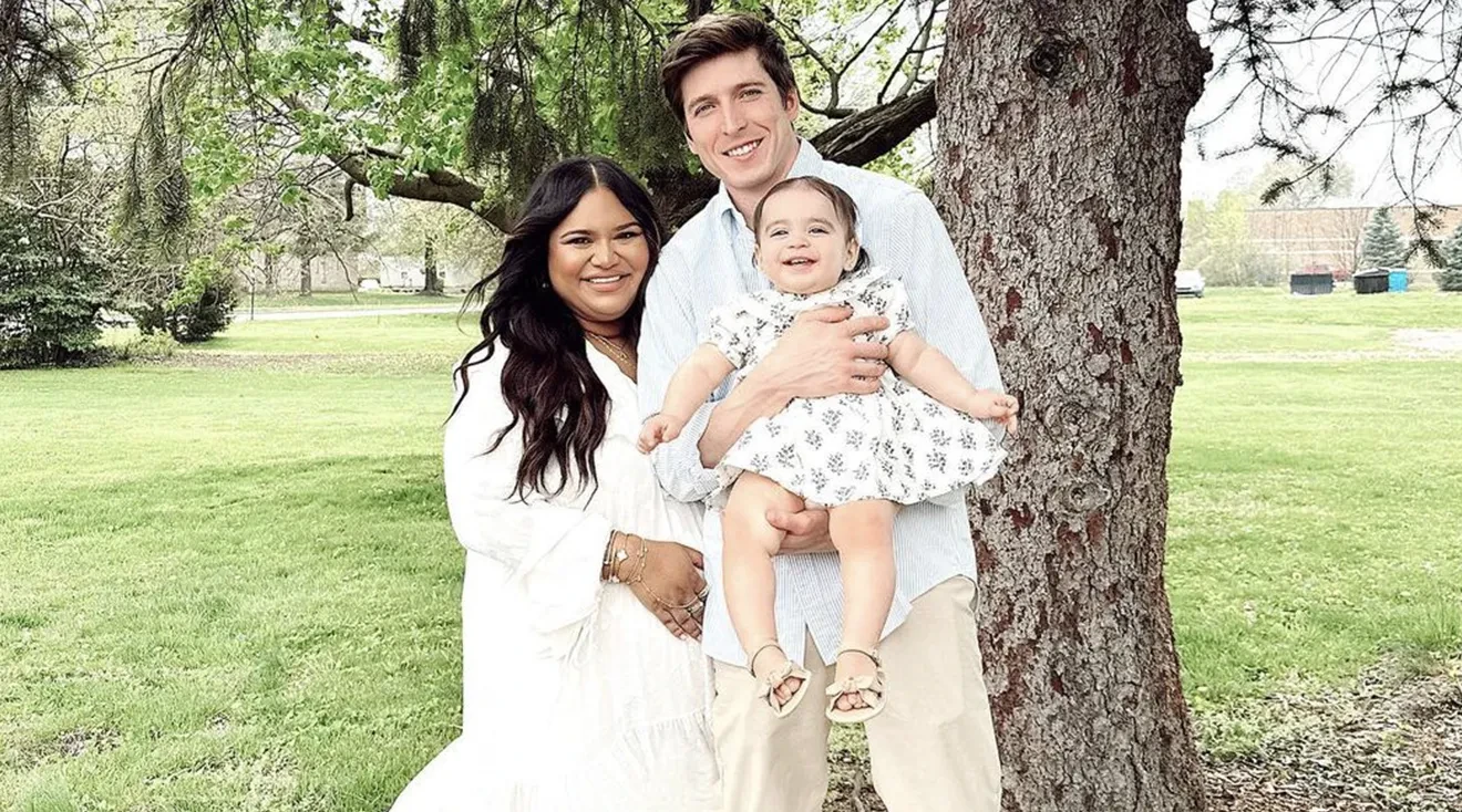 nabela noor and husband seth martin with their daughter at the park