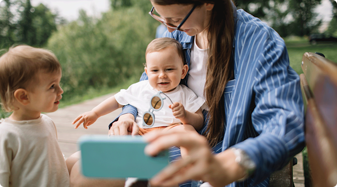 mother recording children on phone