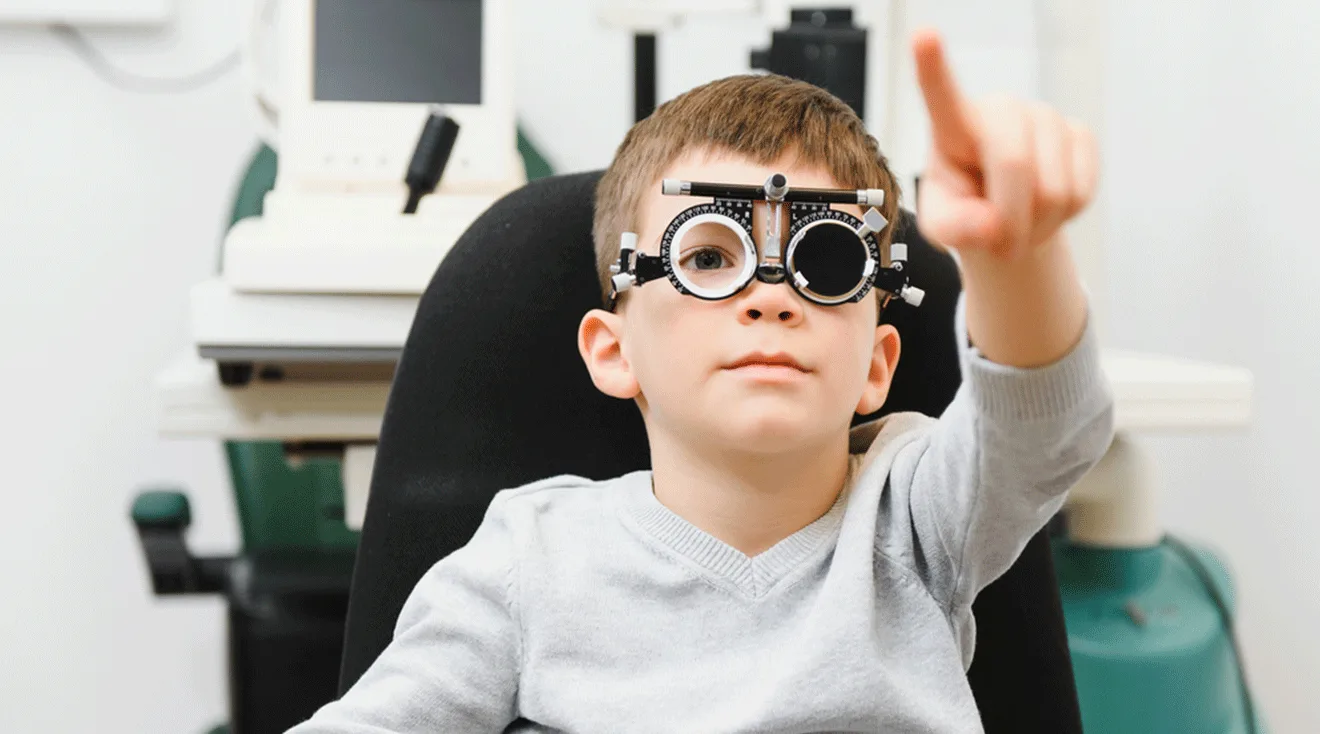 child having an eye exam at pediatric ophthalmologist