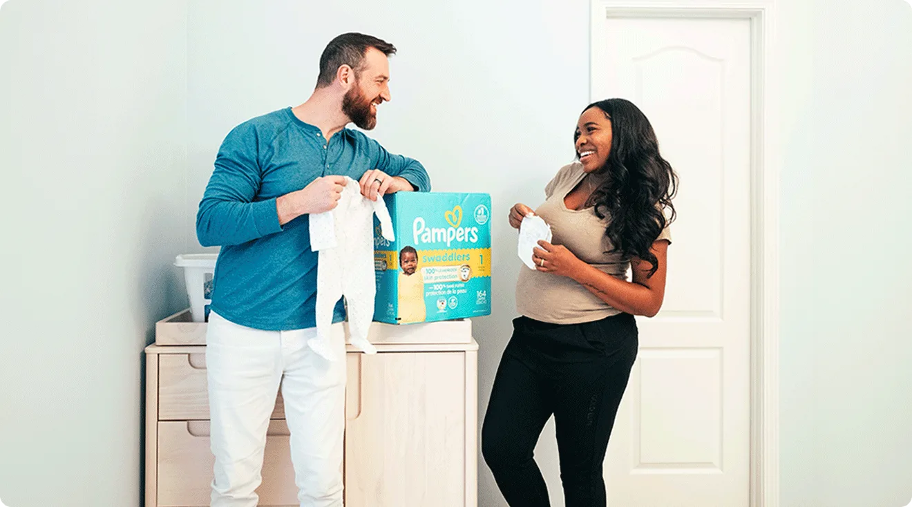Lauren and Cameron Hamilton with pampers
