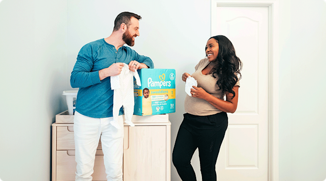 Lauren and Cameron Hamilton with pampers