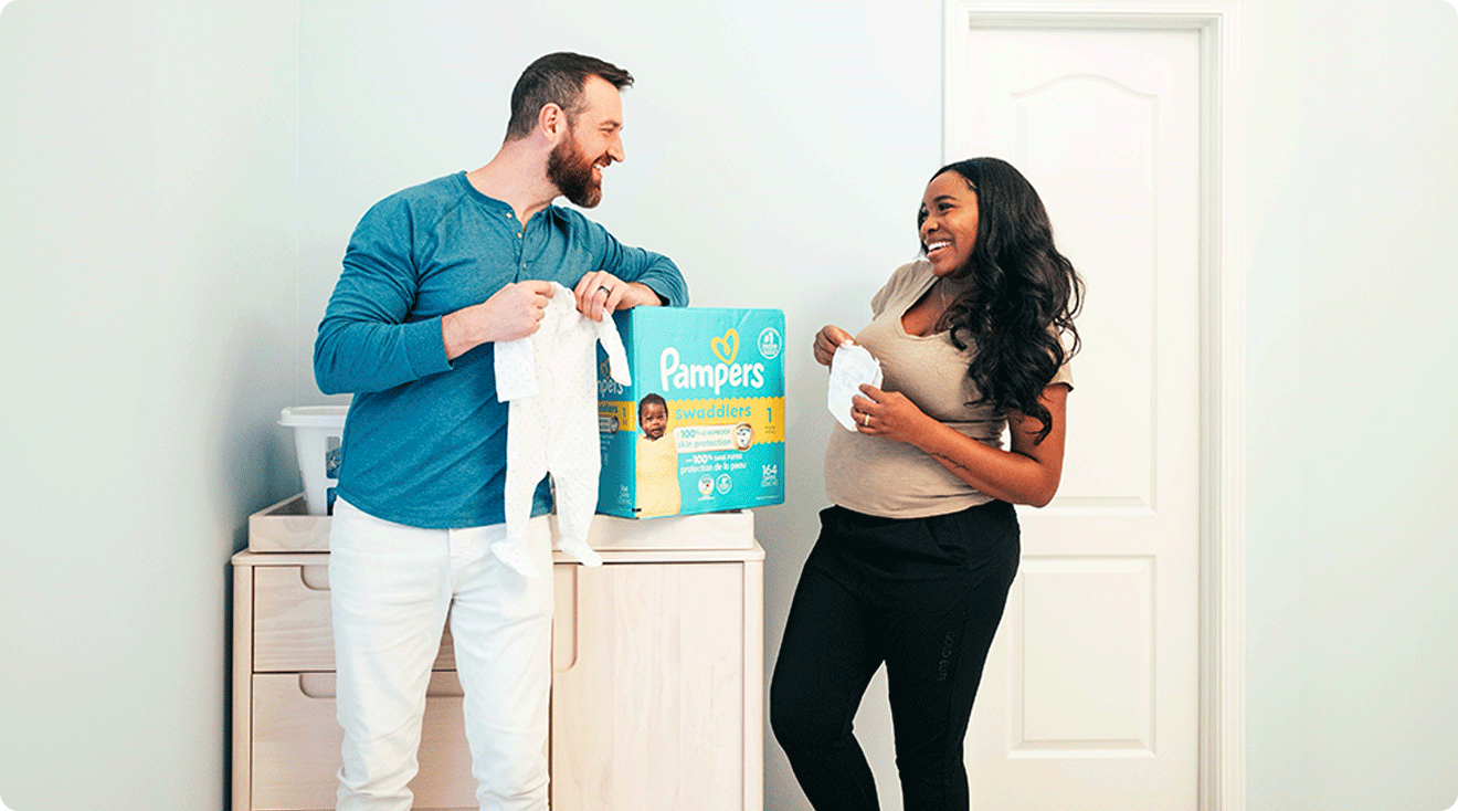 Lauren and Cameron Hamilton with pampers