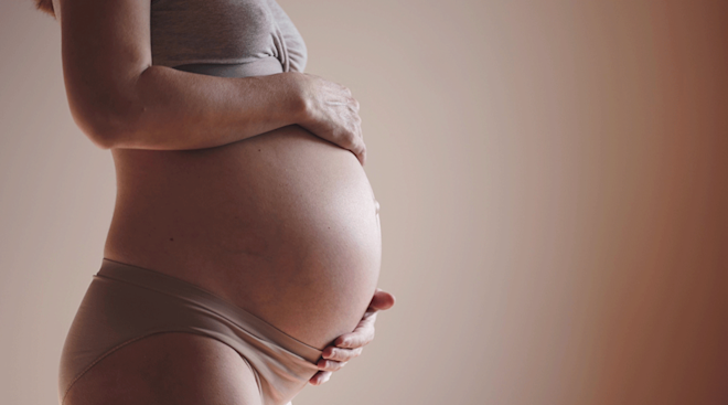 close up of pregnant woman's belly