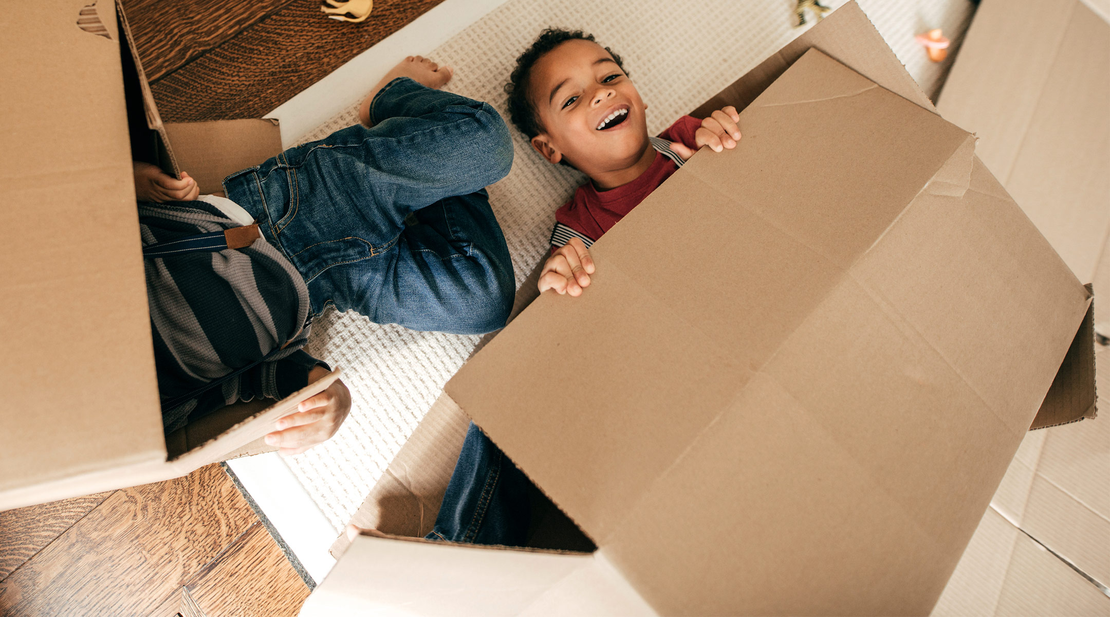 children prefer and have more fun playing with cardboard box