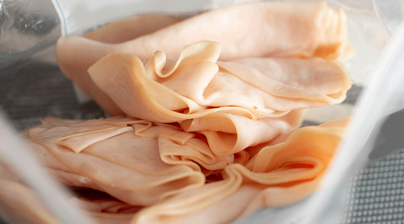 close up of sliced turkey deli meat