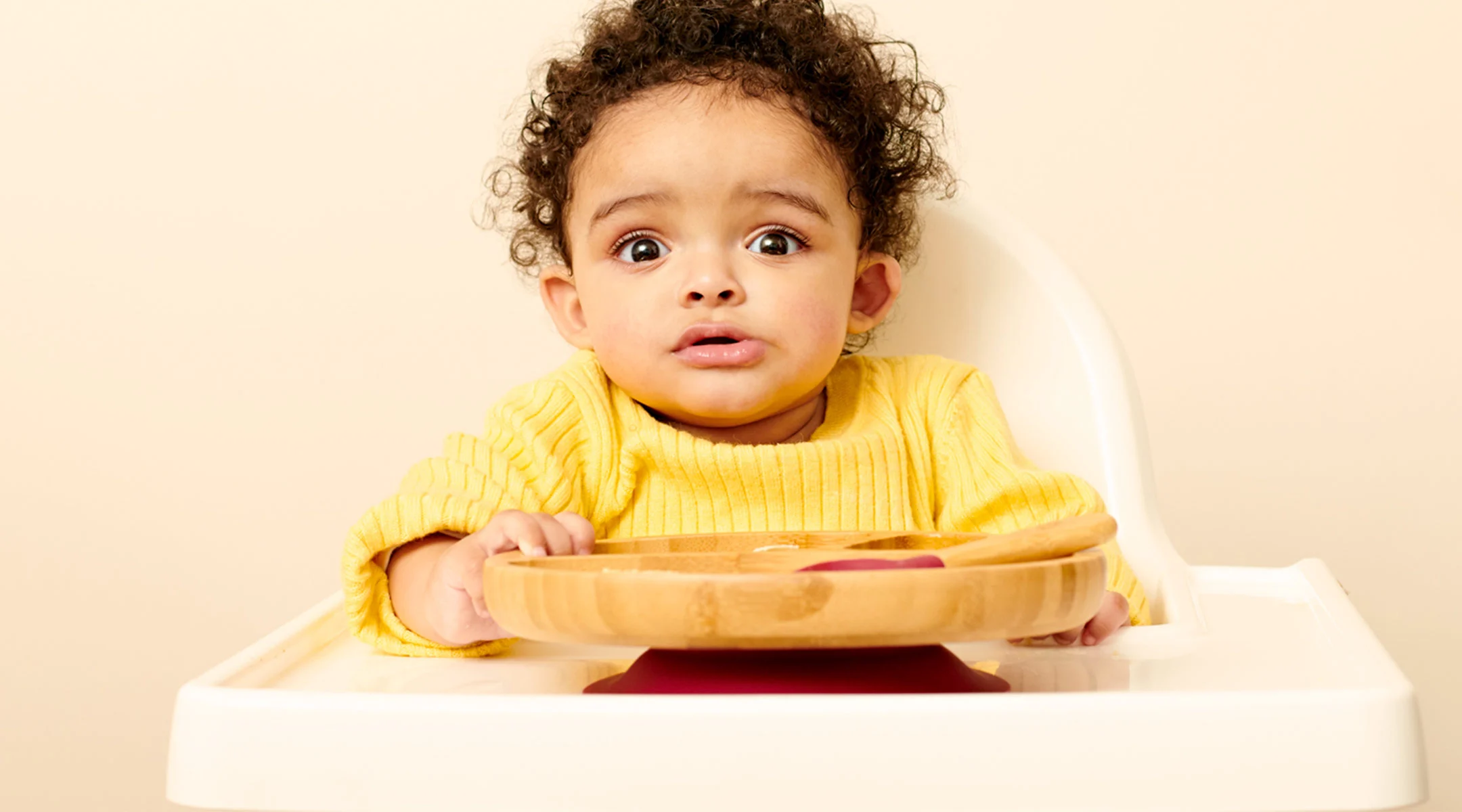 baby demonstrating one of the nine faces of weaning