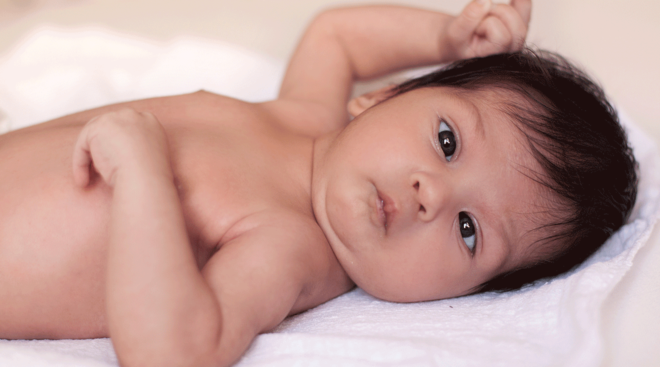 newborn baby with crossed eyes