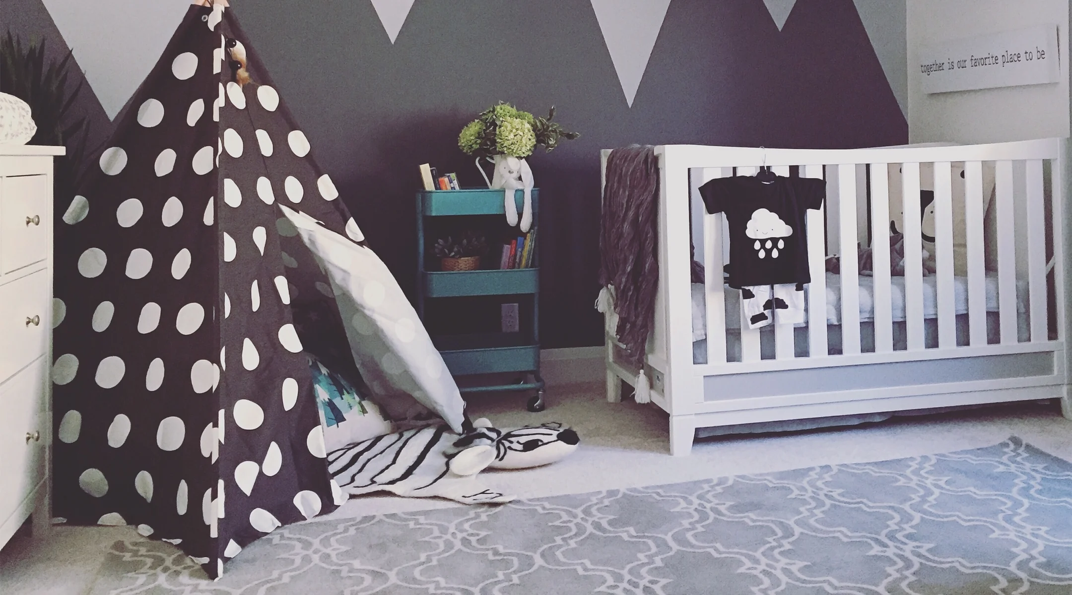kids nursery with polka dot tee-pee set up