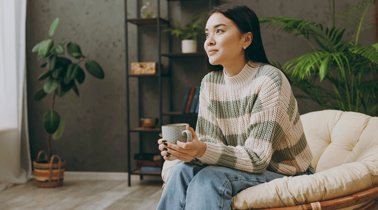 young woman sitting at home