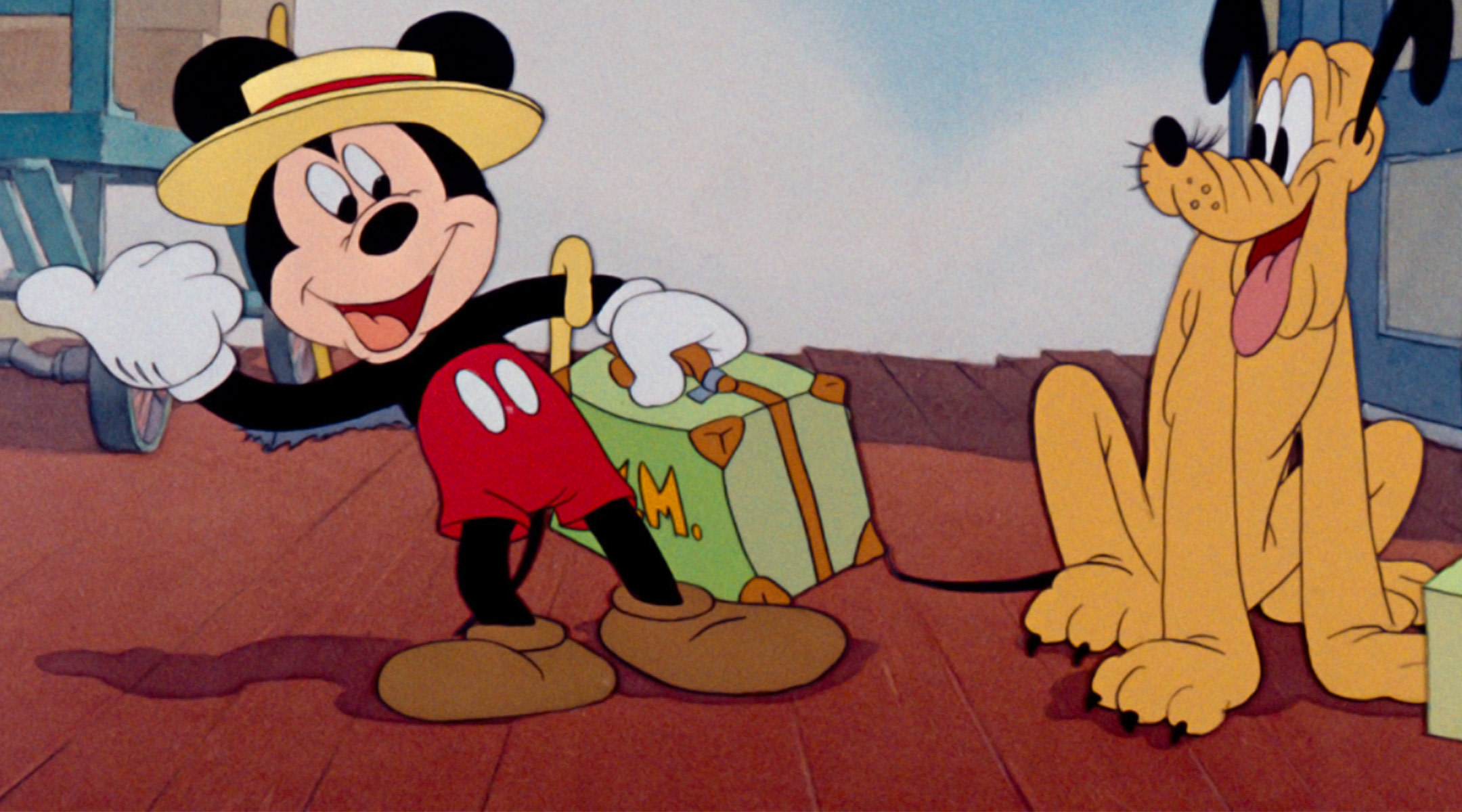cartoon mickey mouse and pluto getting ready for a trip
