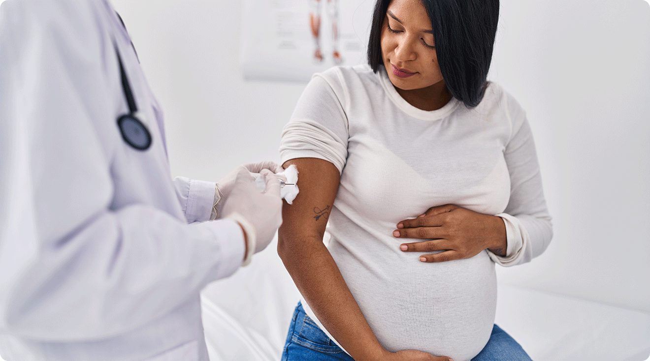 pregnant woman getting a vaccine