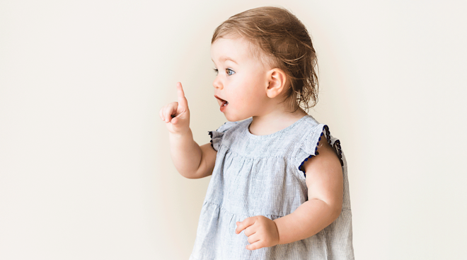 toddler girl saying no with finger