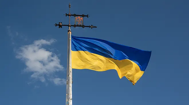 Ukrainian flag with the The coat of arms of the city, Lviv, Ukraine