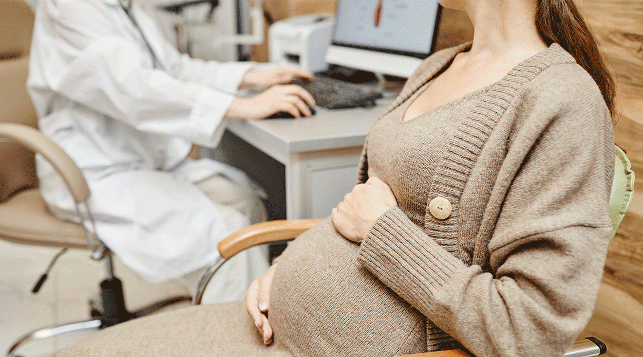 pregnant woman at prenatal doctor appointment