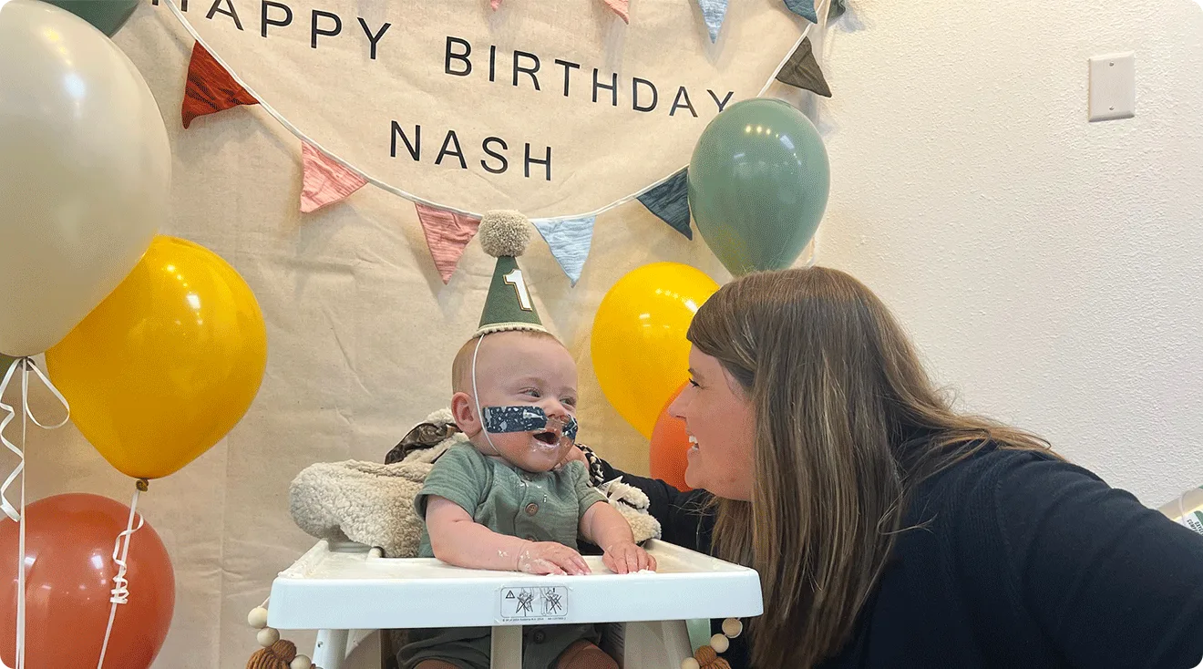 nash keen and mom celebrating his first birthday party