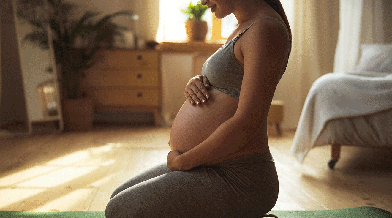 pregnant woman doing yoga