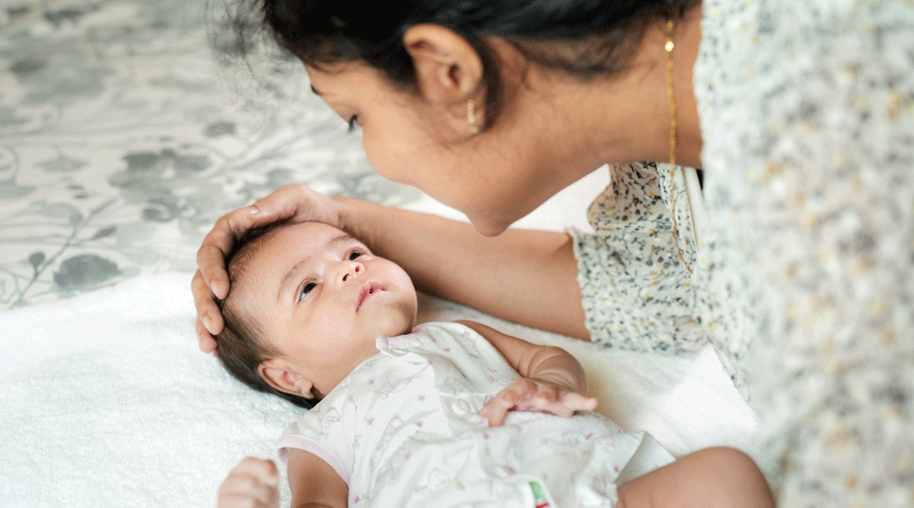 mom looking into baby's eyes