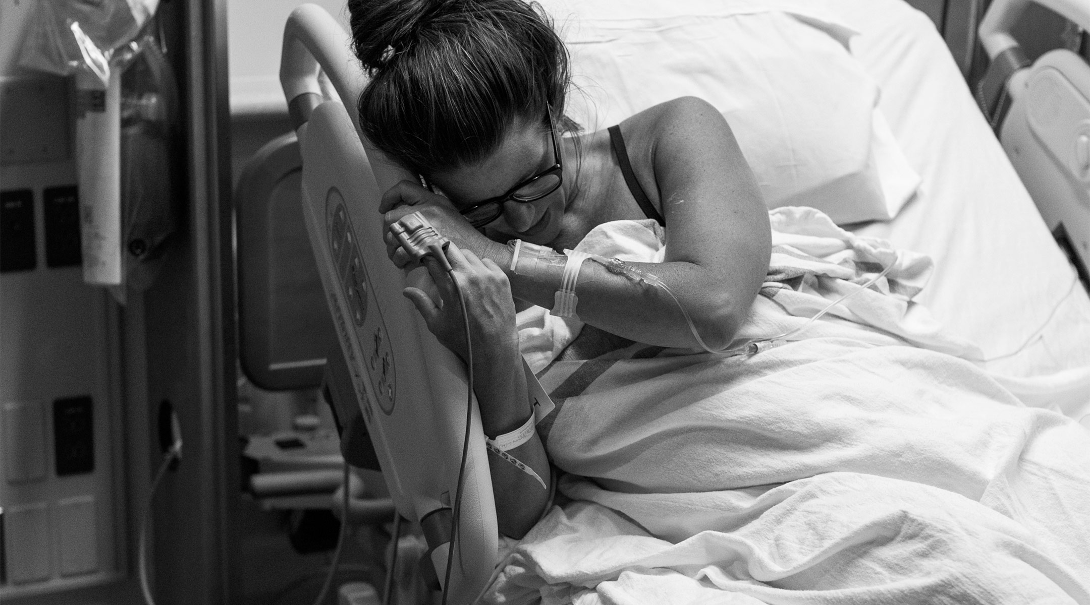 a photograph that shows the importance of moms healing after the birth of their child