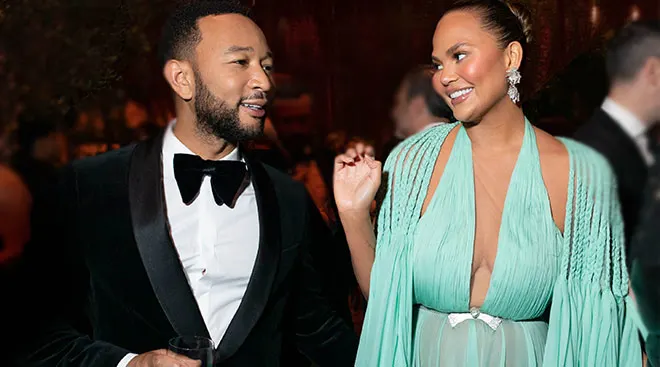 chrissy teigen and john legend at an event
