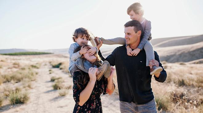 birth order, family posing with their two sons