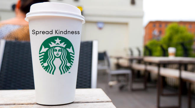 starbucks to go cup with spread kindness messaging