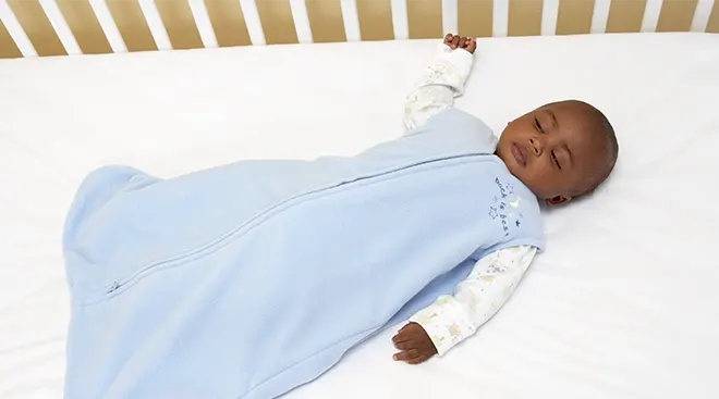 baby sleeping in safe sleeping environment